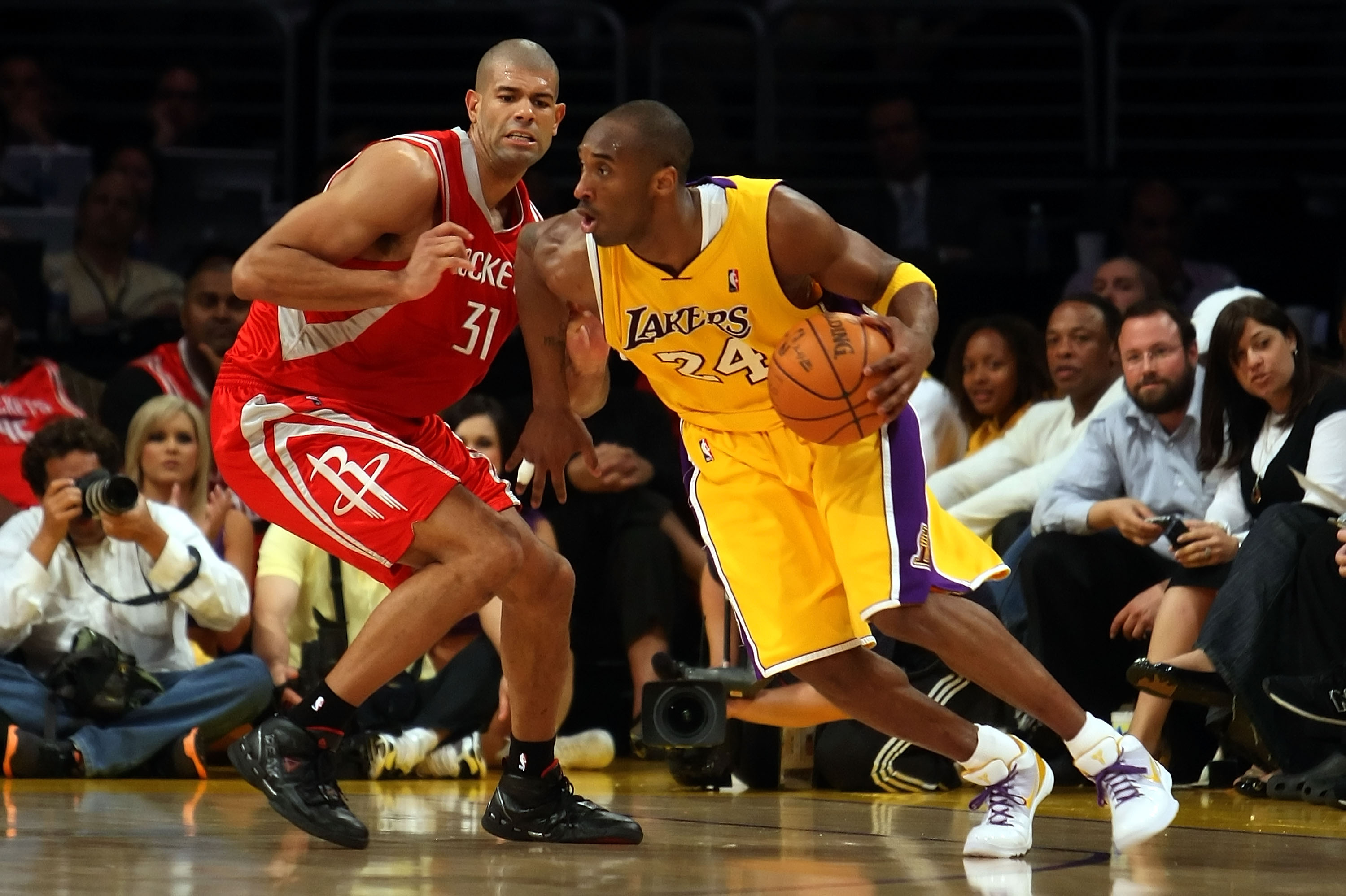 Los Angeles Lakers legend Kobe Bryant drives on Houston Rockets forward during the 2009 NBA Playoffs