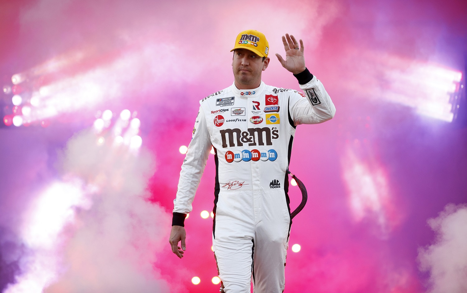 Kyle Busch walks on stage during pre-race ceremonies at the NASCAR Cup Series Federated Auto Parts 400 Salute to First Responders at Richmond Raceway on Sept. 11, 2021.