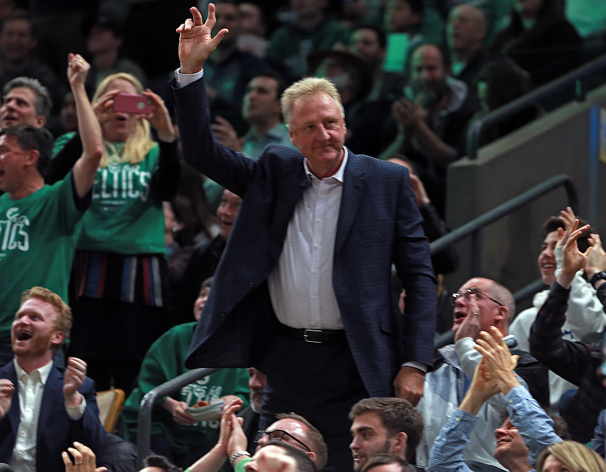 Larry Bird acknowledges the crowd.