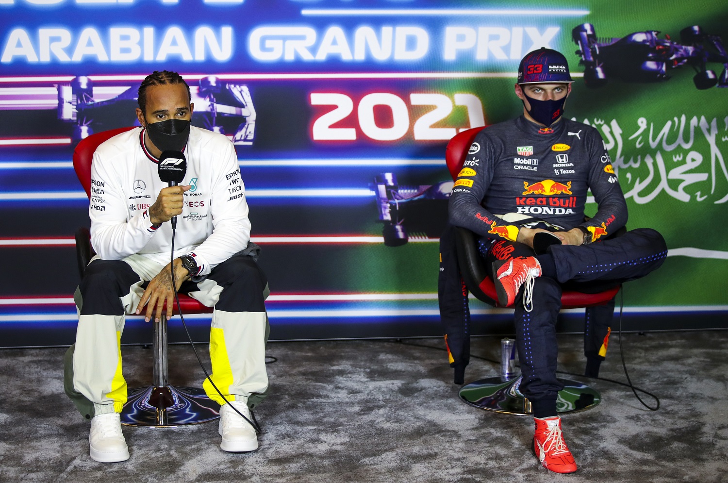 Lewis Hamilton of Mercedes GP and Max Verstappen of Red Bull Racing talk in the press conference after qualifying for the Formula 1 Grand Prix of Saudi Arabia at Jeddah Corniche Circuit. | Florent Gooden - Pool/Getty Images