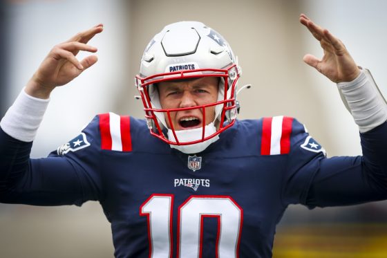 Mac Jones of the New England Patriots looks on before a game against the Tennessee Titans.