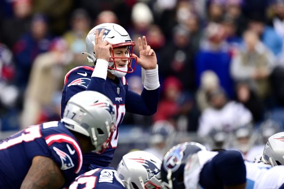 Mac Jones of the New England Patriots calls out the play against the Tennessee Titans.