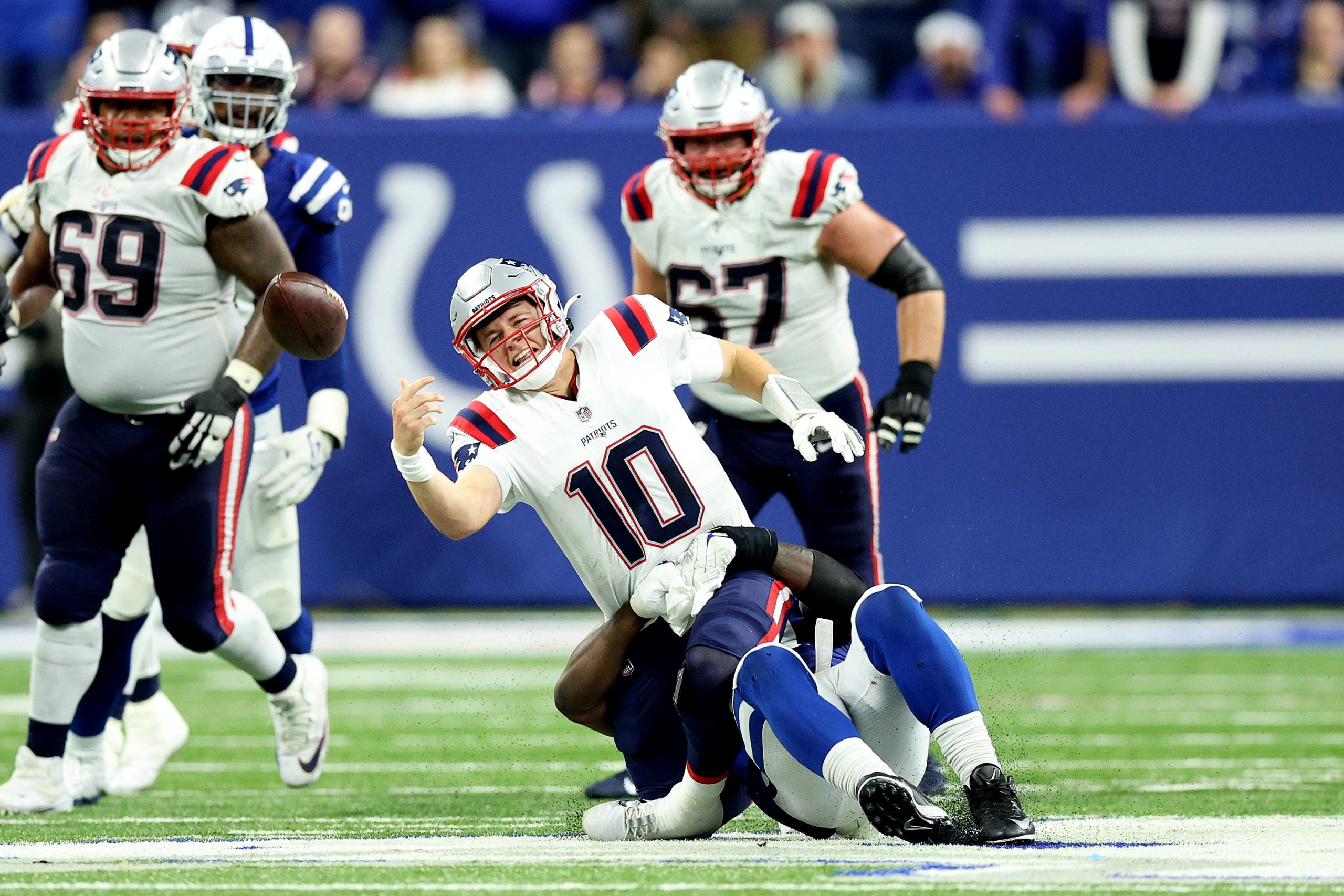 Mac Jones of the New England Patriots throws an incomplete pass.