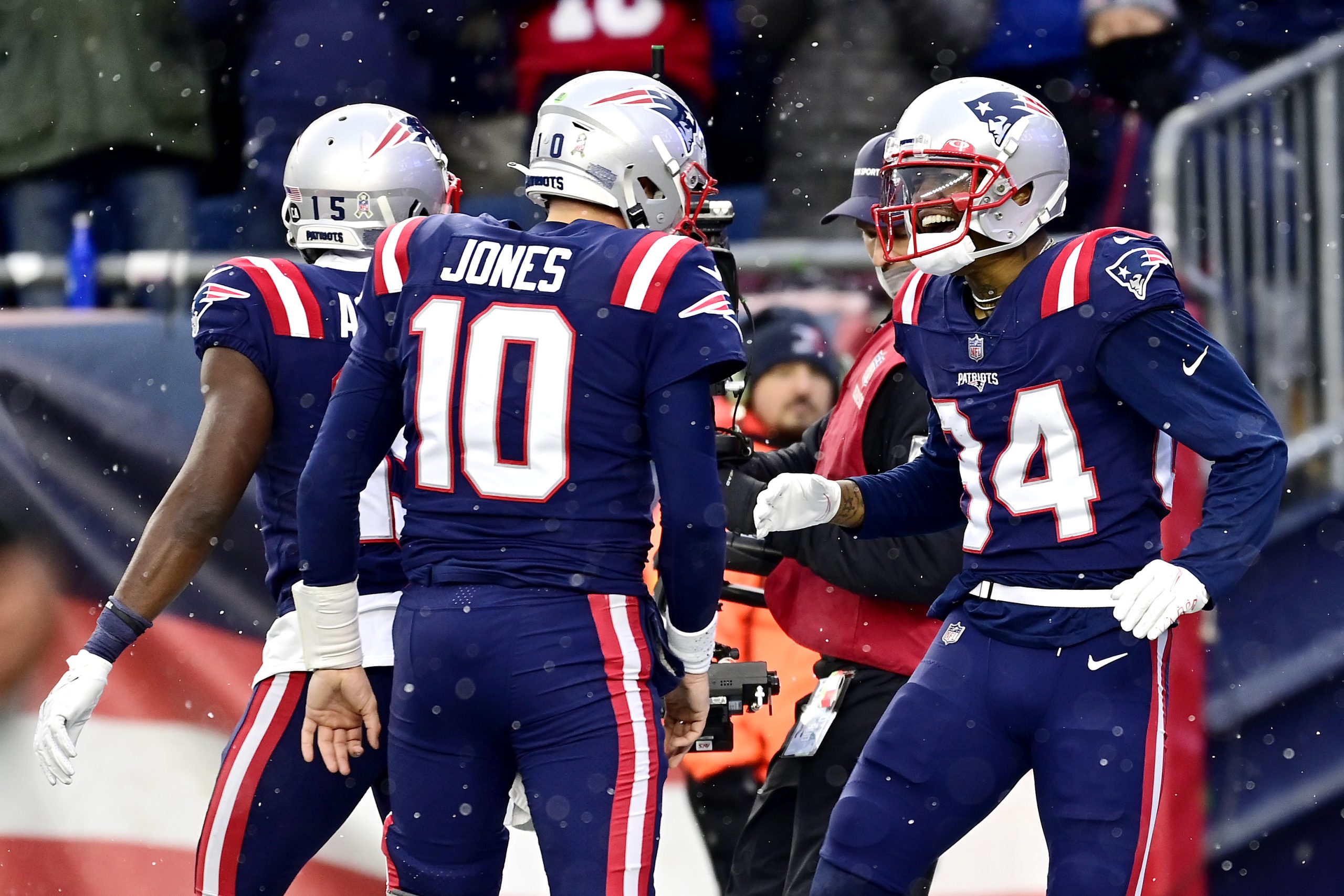 Kendrick Bourne #84 of the New England Patriots celebrates with Mac Jones #10.