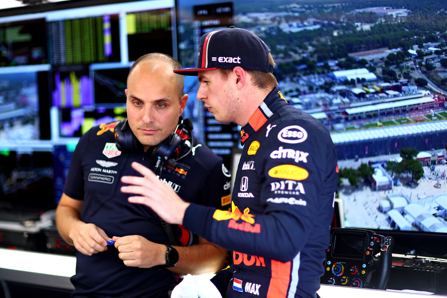 Max Verstappen of Bull Racing talks with race engineer Gianpiero Lambiase in the garage during practice for the Grand Prix of France at Circuit Paul Ricard on June 21, 2019.