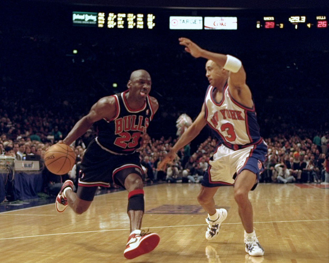 Chicago Bulls' Michael Jordan tries to get past New York Knicks John Starks.