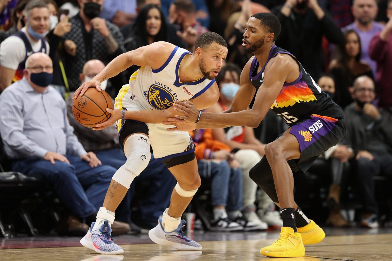 Phoenix Suns swingman Mikal Bridges guards Golden State Warriors star Stephen Curry