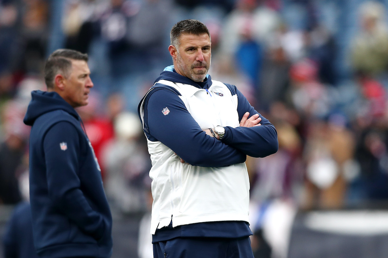 Head coach Mike Vrabel of the Tennessee Titans (R), who just signed LB Zach Cunningham, looks on during warm-up before the game against the New England Patriots at Gillette Stadium on November 28, 2021 in Foxborough, Massachusetts.