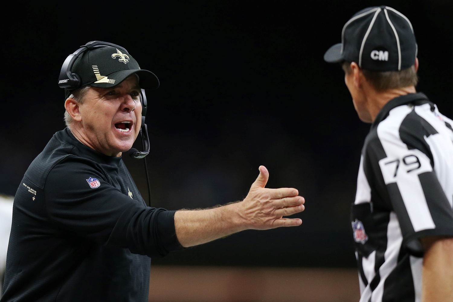 New Orleans Saints head coach Sean Payton argues with a ref.