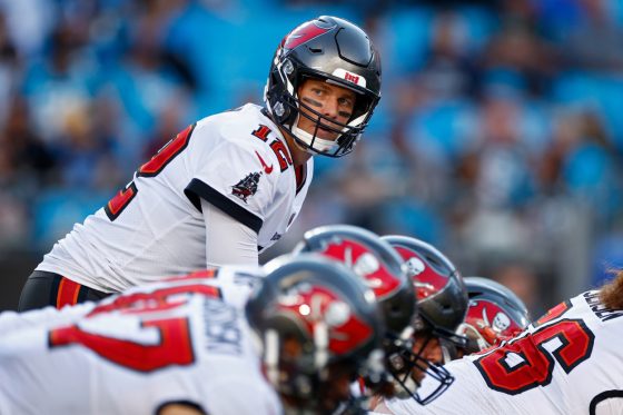 Tom Brady of the Tampa Bay Buccaneers prepares to get the snap .