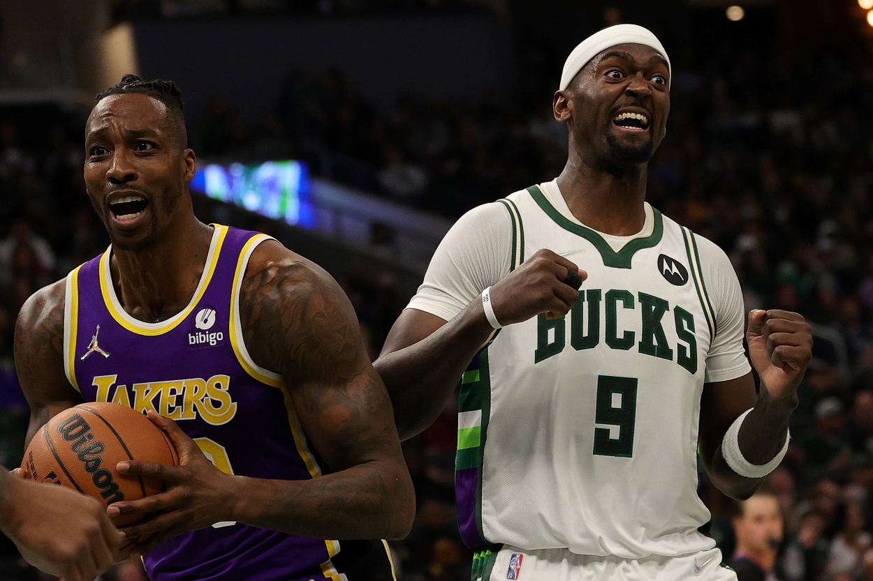 Dwight Howard of the Los Angeles Lakers and Bobby Portis of the Milwaukee Bucks react to a call.