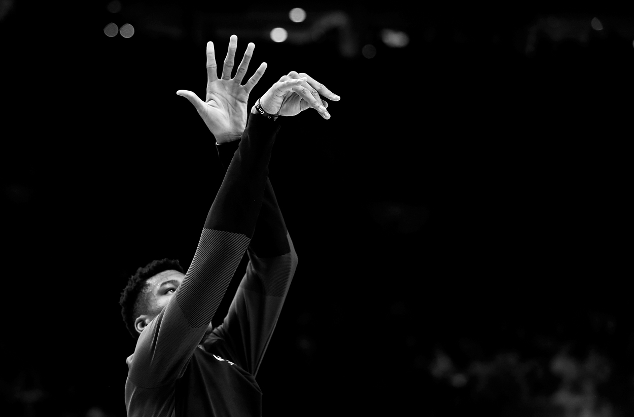 The Milwaukee Bucks Giannis Antetokounmpo works out before a game.