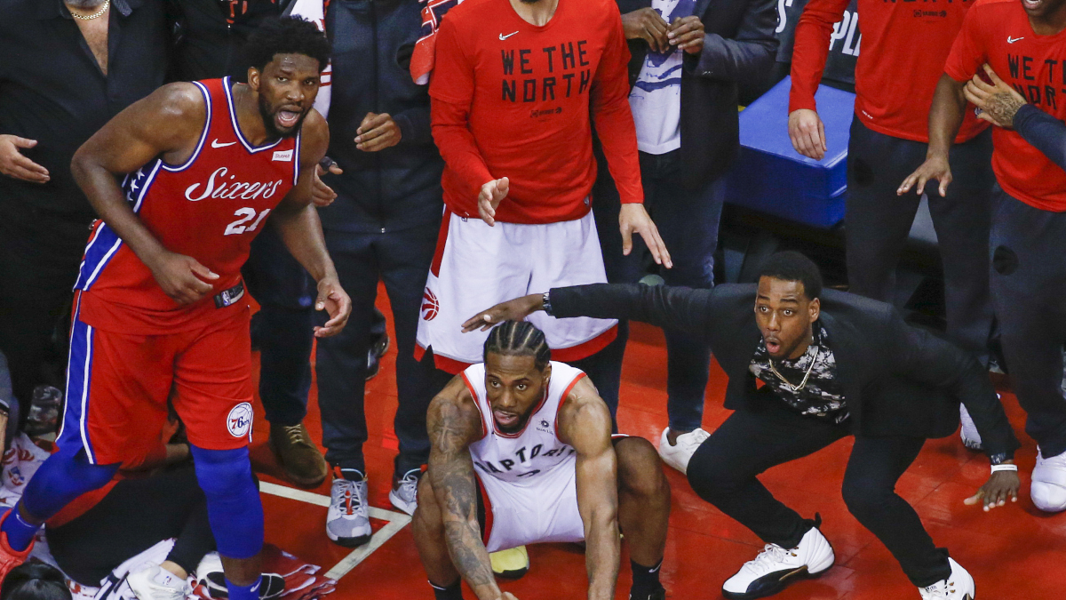 This is an image JJ Redick still has trouble processing: Joel Embiid and Kawhi Leonard watching Leonard's incredible series-clinching shot in the 2019 NBA Playoffs.