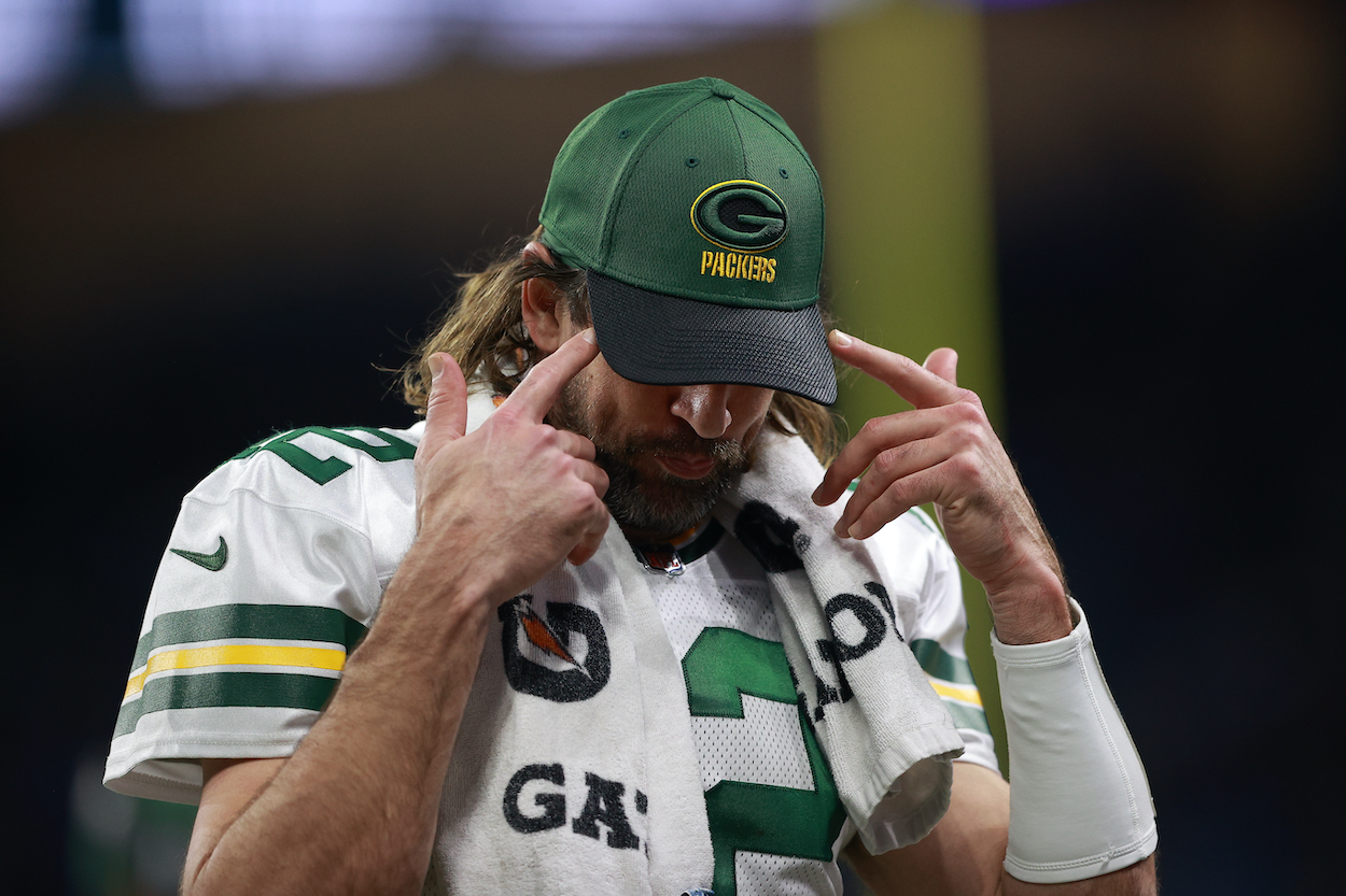 Aaron Rodgers of the Green Bay Packers looks on from the sidelines during the second quarter against the Detroit Lions at Ford Field on January 09, 2022 in Detroit, Michigan.