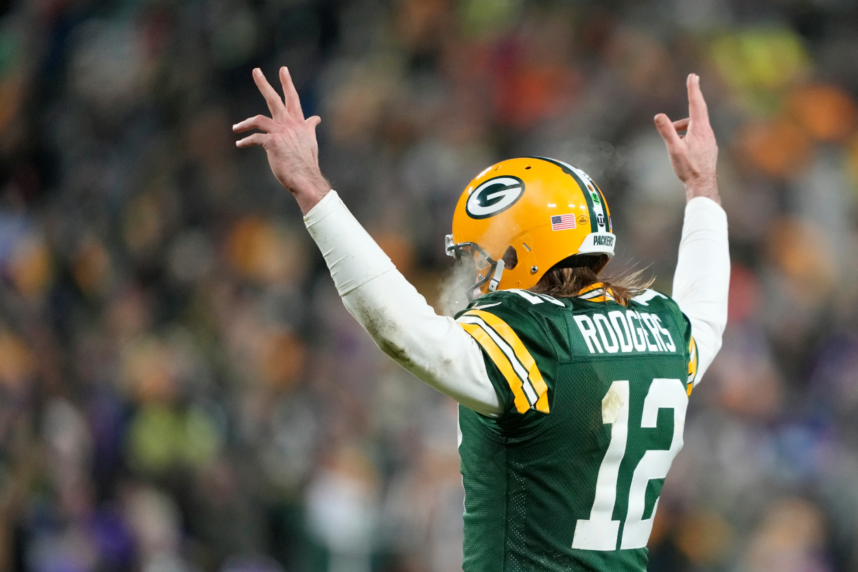 Quarterback Aaron Rodgers of the Green Bay Packers celebrates after a touchdown.