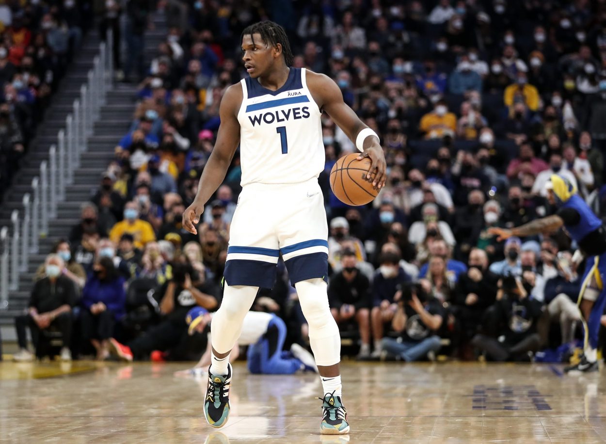 Minnesota Timberwolves guard Anthony Edwards dribbles the ball during an NBA game against the Golden State Warriors