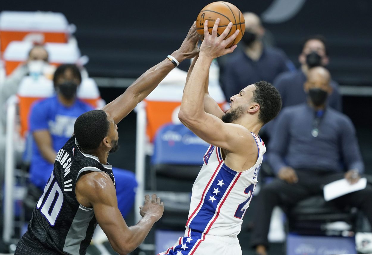 Philadelphia 76ers guard Ben Simmons drives to the basket during an NBA game against the Sacramento Kings in February 2021
