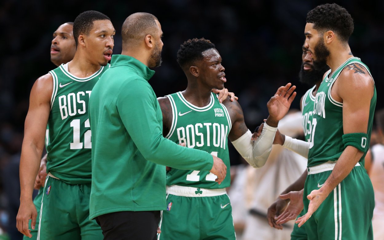 Boston Celtics stars Dennis Schroder and Jayson Tatum during a game in 2021. The Celtics recently received heavy criticism from Hall of Famer Bob Cousy.