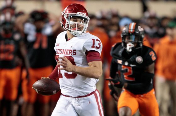 Oklahoma Sooners quarterback Caleb Williams runs up field against Oklahoma State on Nov. 27, 2021, in Stillwater, Oklahoma.