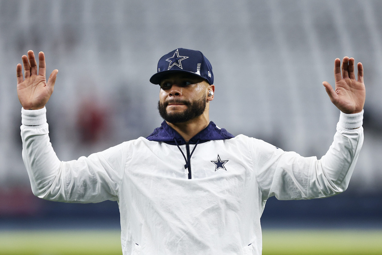 Dak Prescott of the Dallas Cowboys, who issued an apology to referees Tuesday, warms up prior to a game against the San Francisco 49ers in the NFC Wild Card Playoff game at AT&T Stadium on January 16, 2022 in Arlington, Texas.