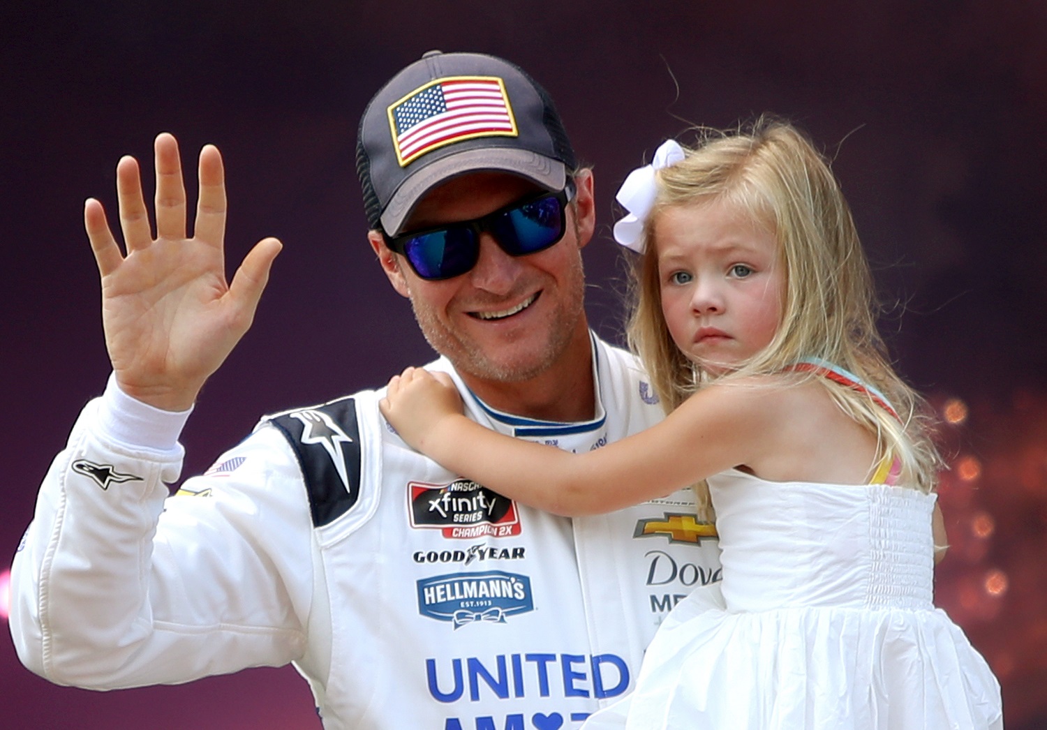 Dale Earnhardt Jr., carries daughter Isla Rose during pre-race ceremonies prior to the NASCAR Xfinity Series Go Bowling 250 at Richmond Raceway on Sept. 11, 2021, in Richmond, Virginia.