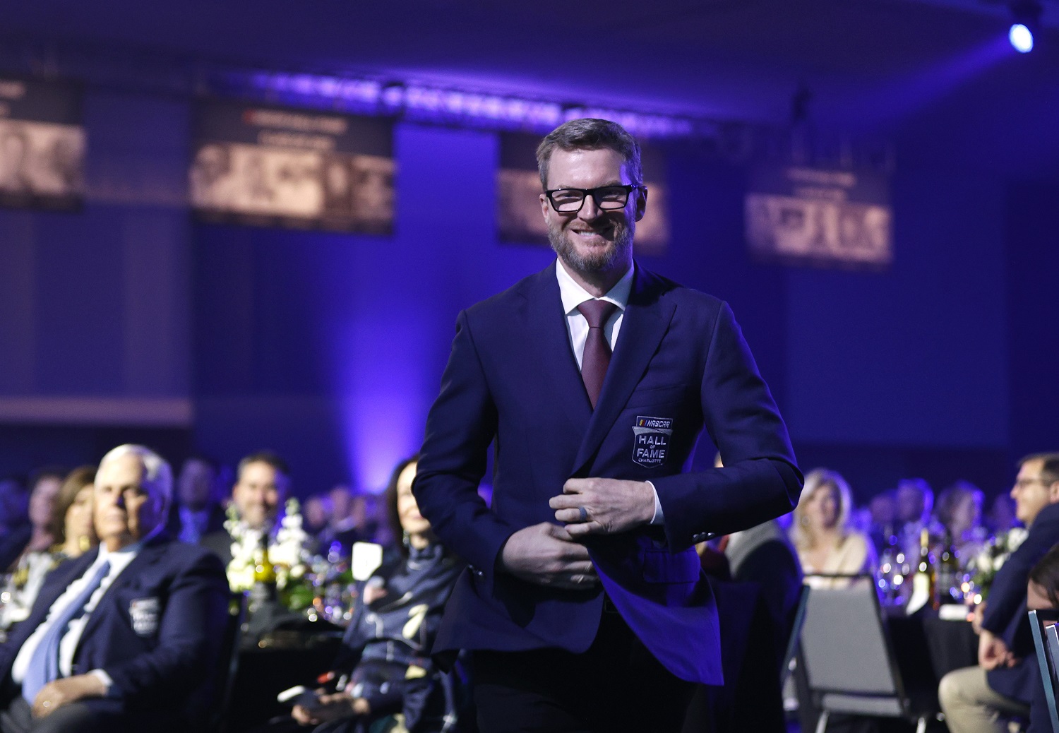 Dale Earnhardt Jr. walks onto the stage during the 2021 NASCAR Hall of Fame Induction ceremony on Jan. 21, 2022. in Charlotte, North Carolina.