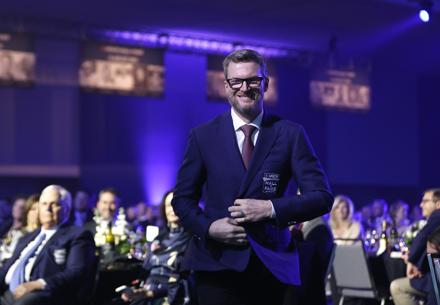 Dale Earnhardt Jr. walks onto the stage during the 2021 NASCAR Hall of Fame Induction ceremony  on Jan. 21, 2022. in Charlotte, North Carolina.