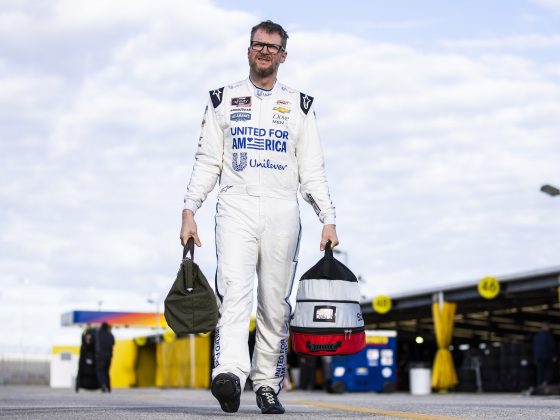 Dale Earnhardt Jr. walks in the garage area during the NASCAR Next Gen Test at Daytona International Speedway on Jan. 12, 2022, in Daytona Beach, Florida.