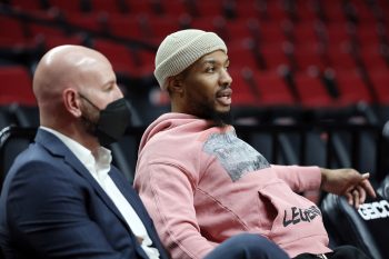 Portland Trail Blazers point guard Damian Lillard looks on before an NBA game against the Miami Heat