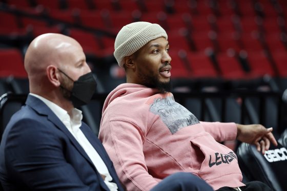 Portland Trail Blazers point guard Damian Lillard looks on before an NBA game against the Miami Heat
