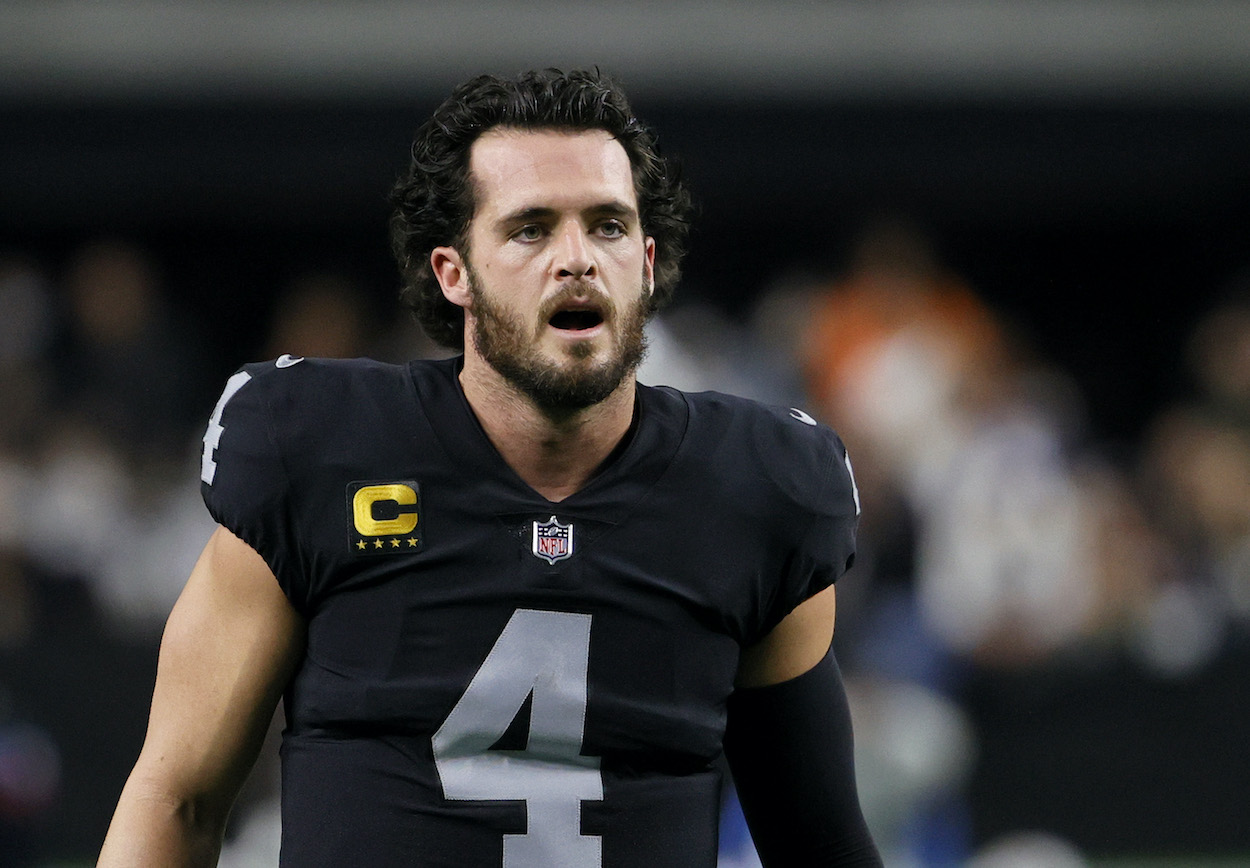 Quarterback Derek Carr of the Las Vegas Raiders warms up before a game against the Los Angeles Chargers at Allegiant Stadium on January 9, 2022 in Las Vegas, Nevada.