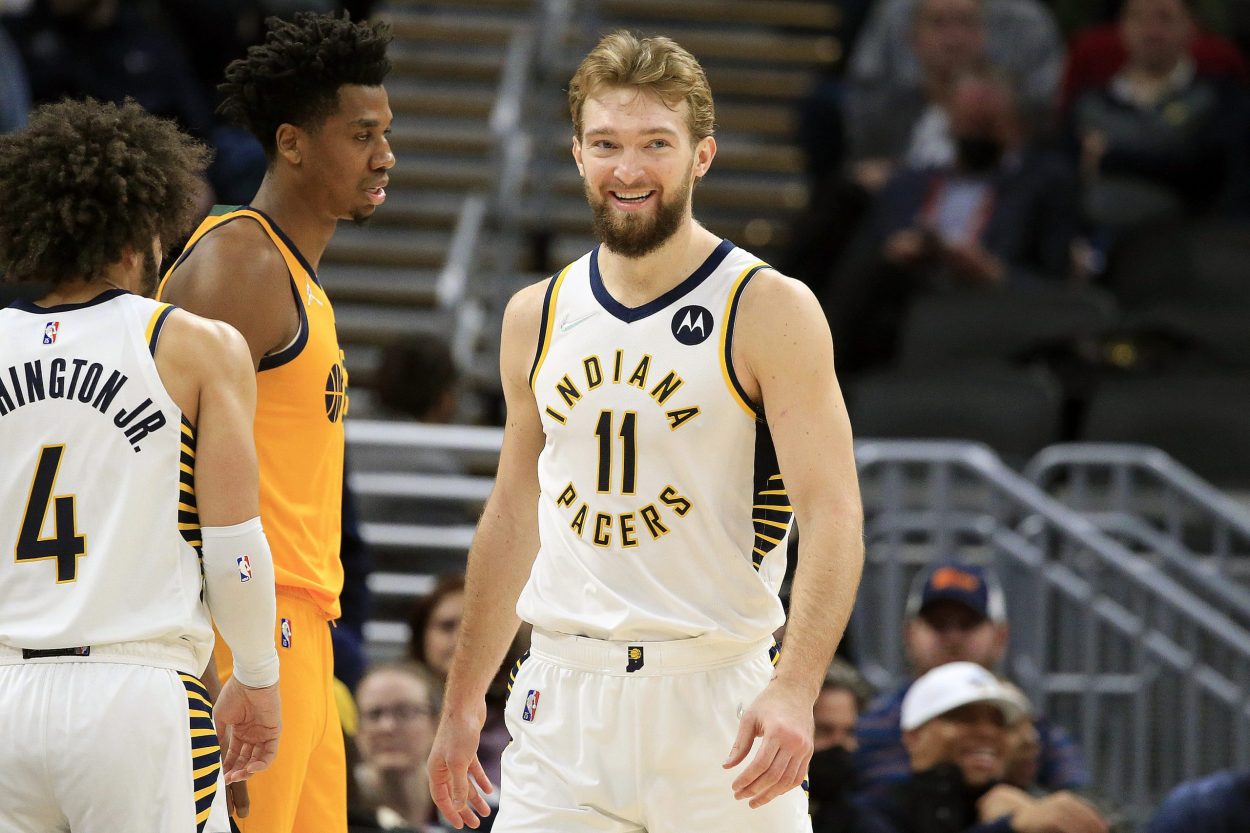 Indiana Pacers big man Domantas Sabonis smiles during an NBA game against the Utah Jazz