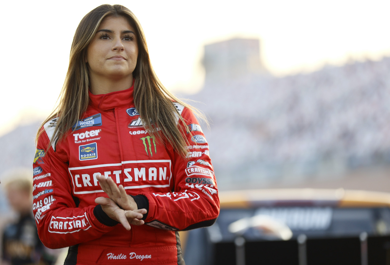 Hailie Deegan waits on grid