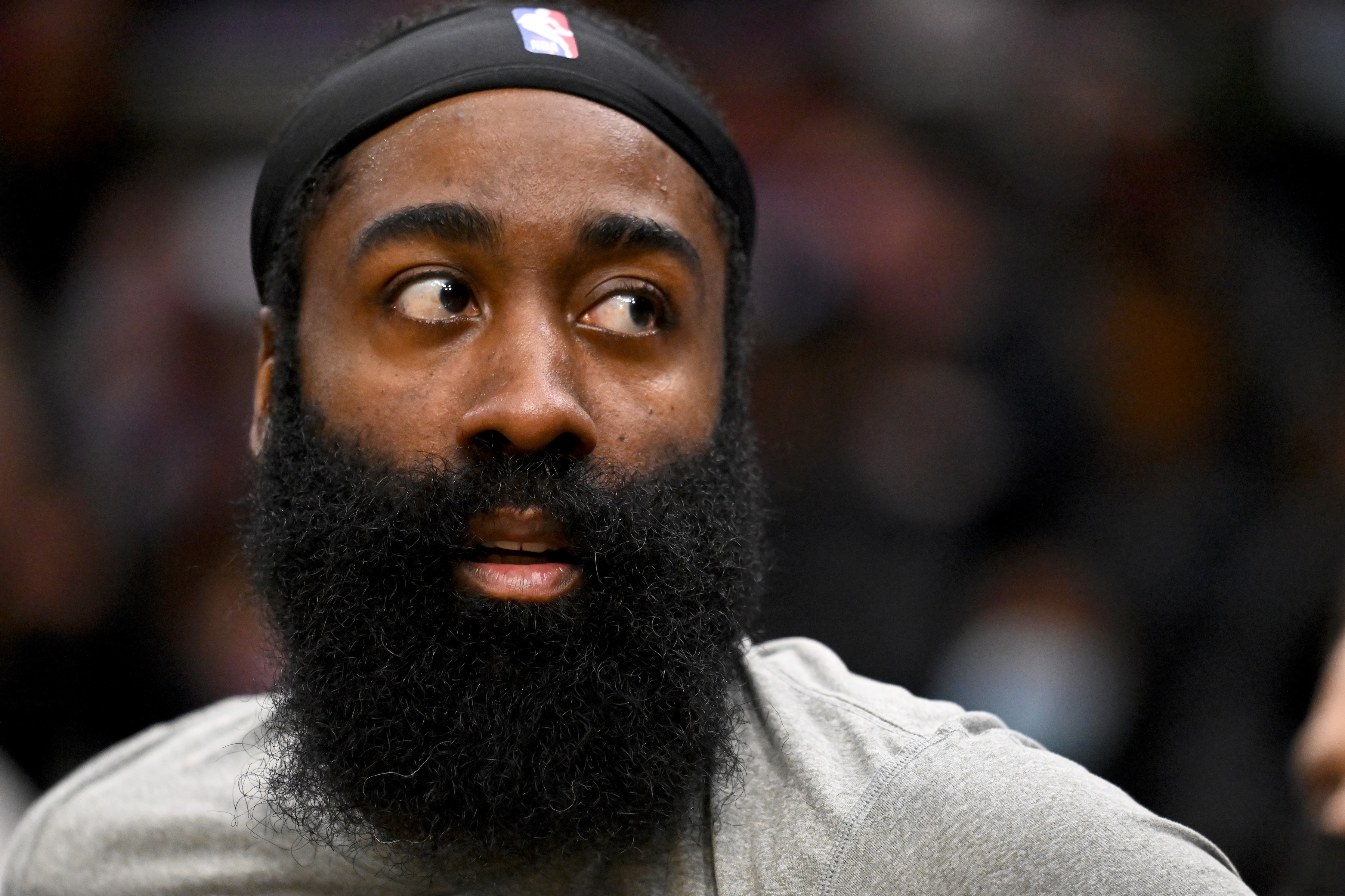 Brooklyn Nets star James Harden looks on before an NBA game against the Cleveland Cavaliers