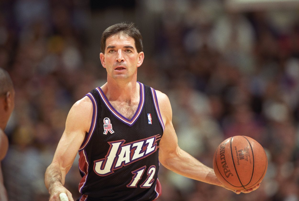 John Stockton of the Utah Jazz with the ball during a National Basketball Association game against the Los Angeles Lakers.