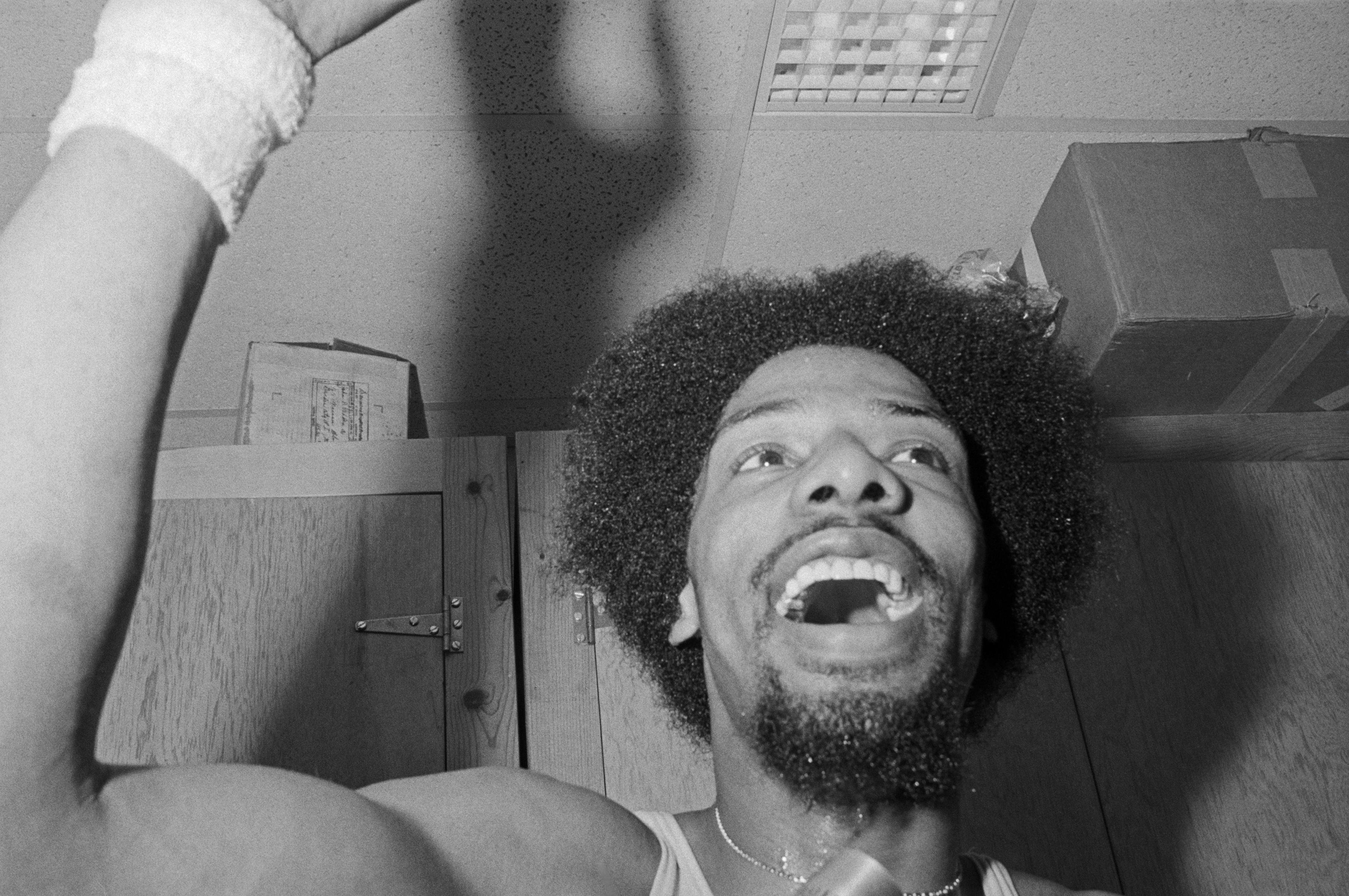 NBA Hall of Famer Julius Erving celebrates after winning the ABA championship