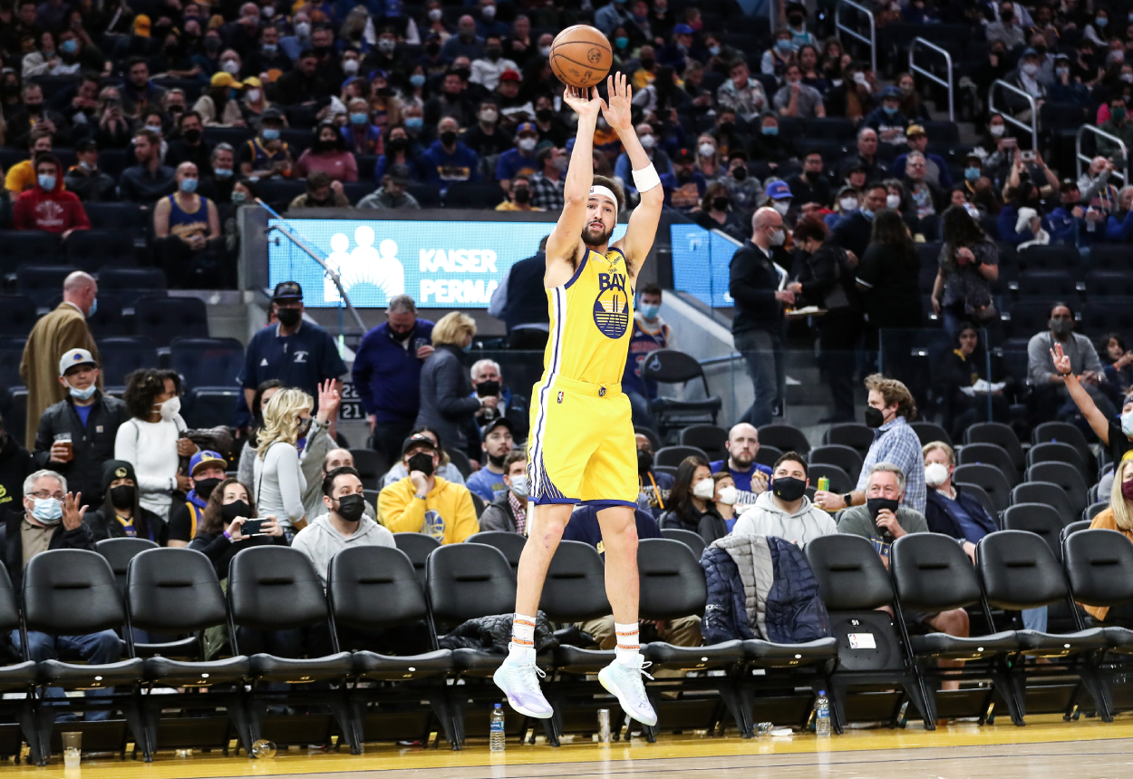 Klay Thompson of the Golden State Warriors shoots a 3-point jump shot in the second half against the Minnesota Timberwolves.