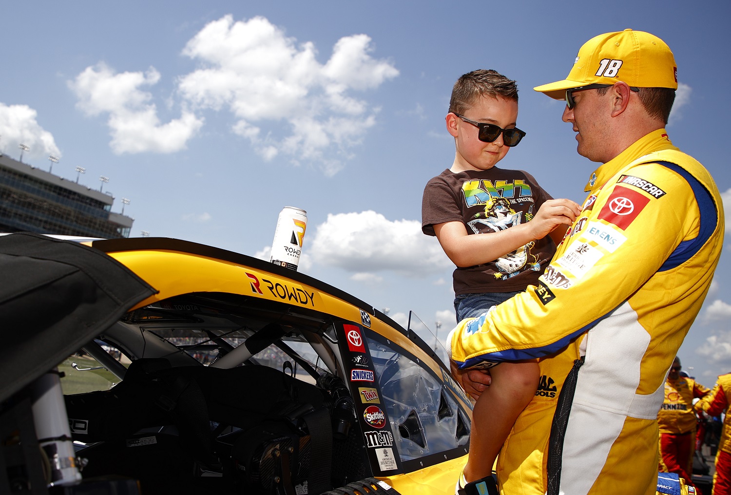 Kyle Busch, driver of the No. 18 Toyota, spends time with son Brexton prior to the NASCAR Cup Series Ally 400 at Nashville Superspeedway on June 20, 2021.