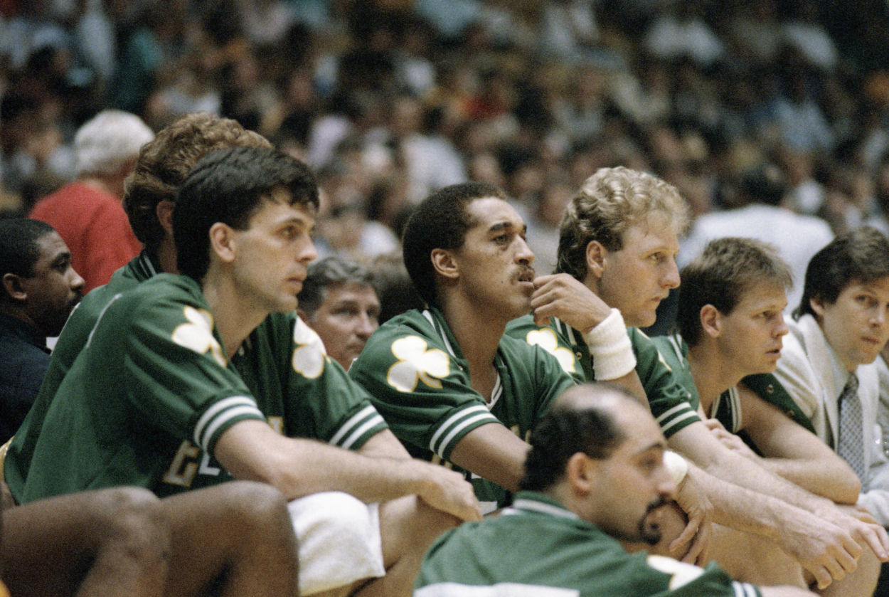 Boston Celtics players (from left) Kevin McHale, Dennis Johnson, Larry Bird and Danny Ainge watch from the bench.