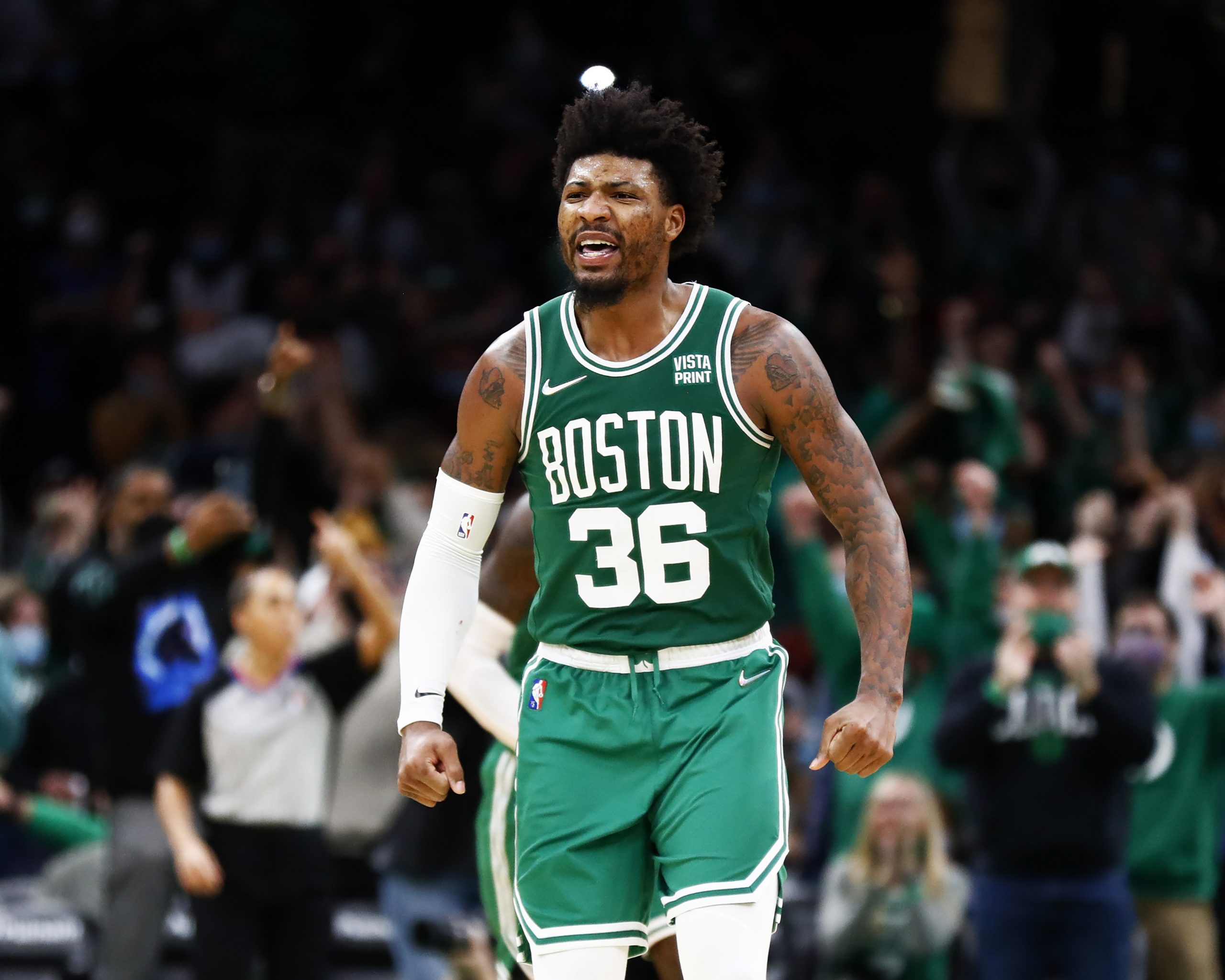 Marcus Smart of the Boston Celtics reacts after scoring during the fourth quarter of the game against the Orlando Magic.