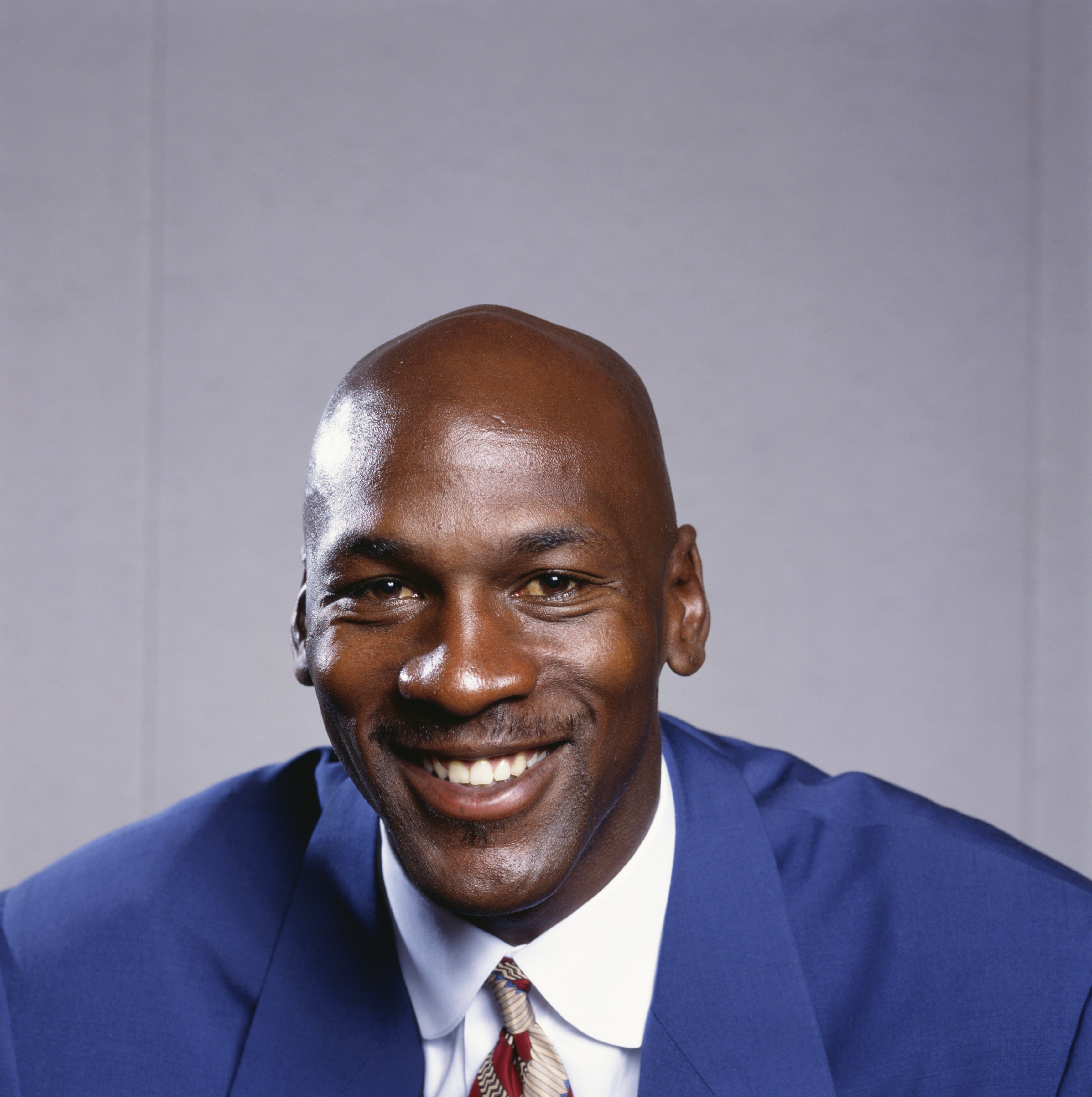 Chicago Bulls great Michael Jordan smiling for a portrait