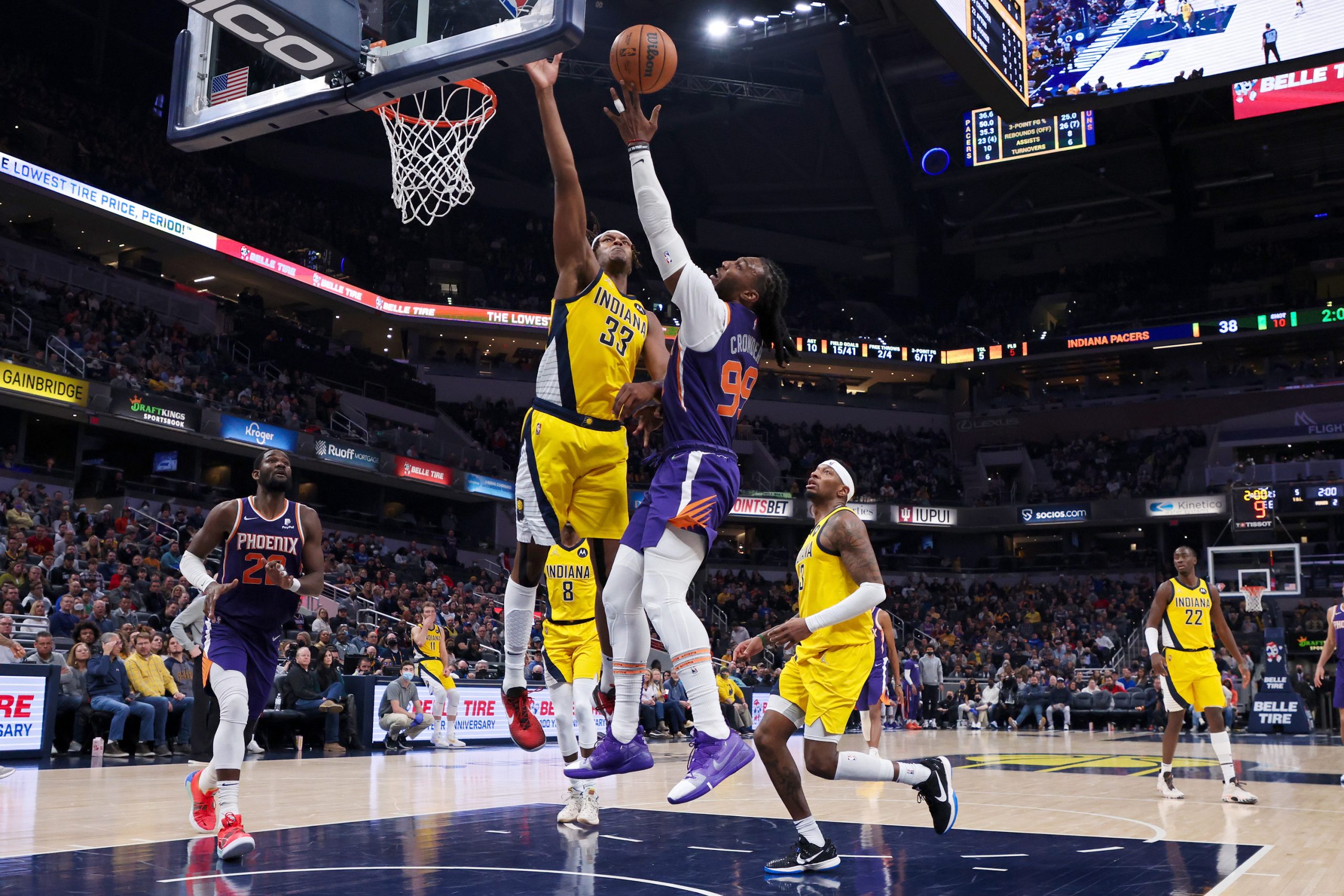 Indiana Pacers big man Myles Turner tries to block Memphis Grizzlies forward Jae Crowder's shot during an NBA game in January 2022