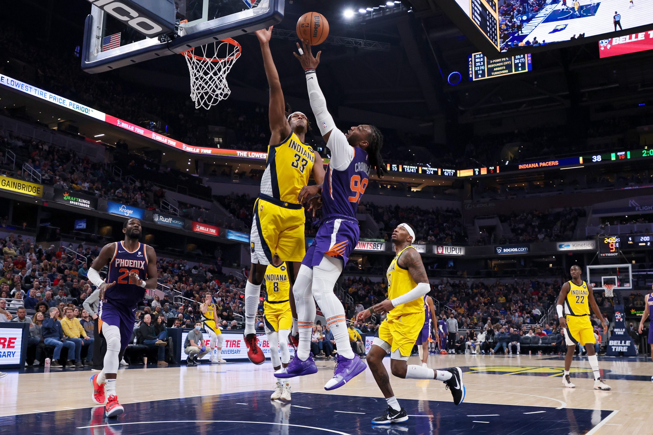 Indiana Pacers big man Myles Turner tries to block Memphis Grizzlies forward Jae Crowder's shot during an NBA game in January 2022