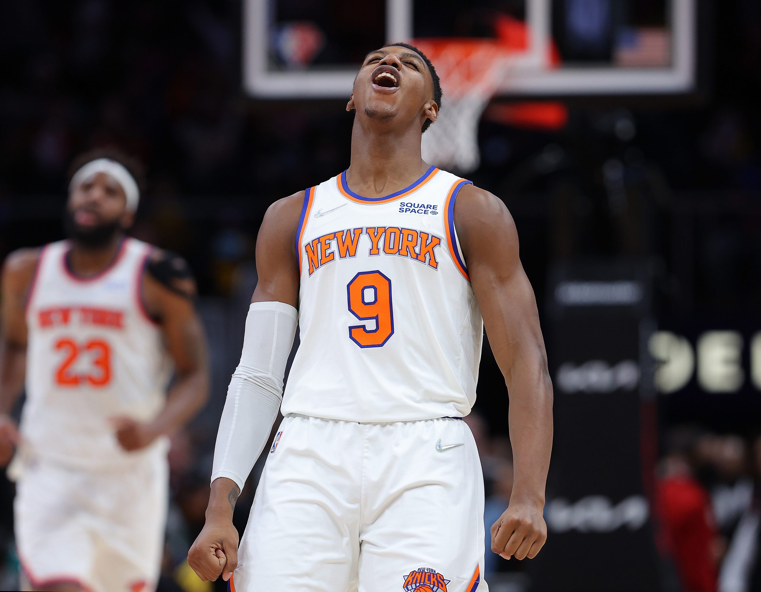 New York Knicks rising star RJ Barrett celebrates a dunk by teammate Mitchell Robinson in a recent win over the Atlanta Hawks.