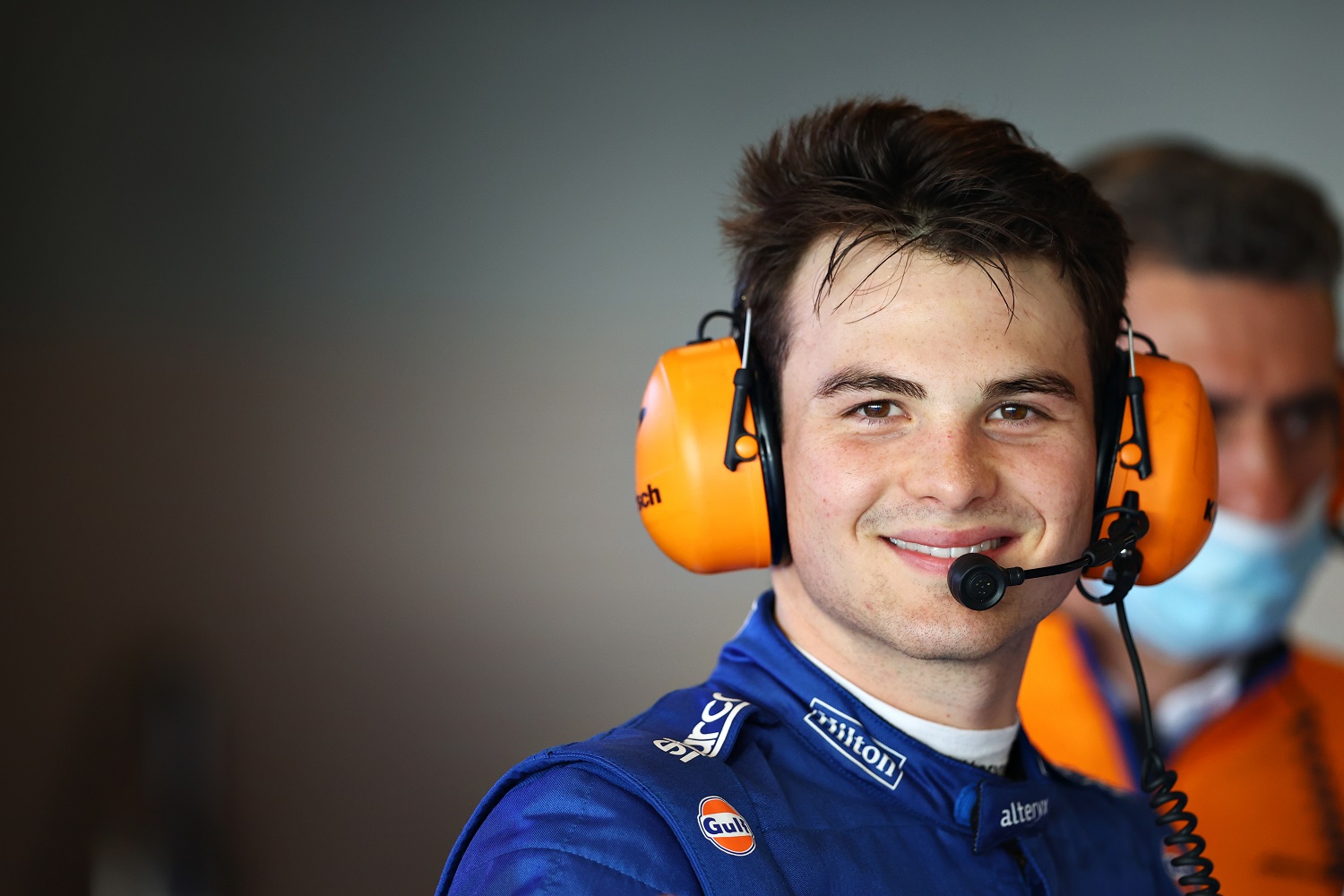 Pato O’Ward looks on in the McLaren garage during Formula 1 testing at Yas Marina Circuit on Dec. 14, 2021, in Abu Dhabi, United Arab Emirates. | Photo by Clive Rose/Getty Images