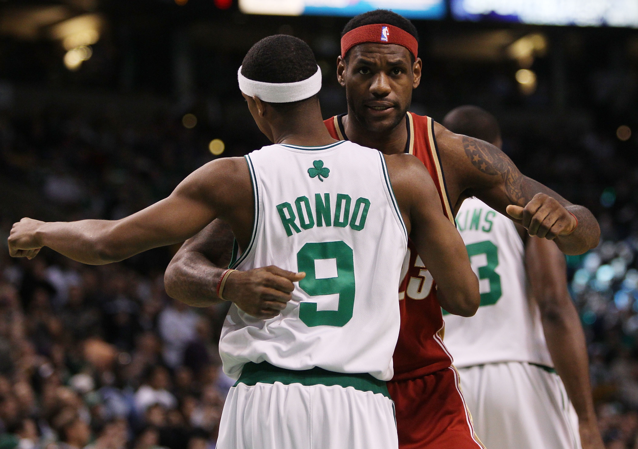 Former Boston Celtics star Rajon Rondo and former Cleveland Cavaliers star LeBron James during a Celtics and Cavs game in 2010.