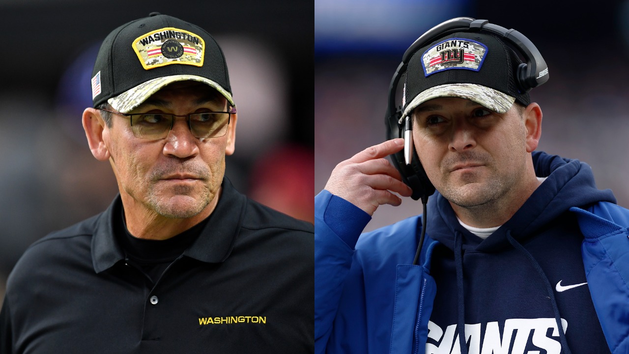 Washington Football Team head coach Ron Rivera looks on during game; Giants HC Joe Judge reacts mid-game