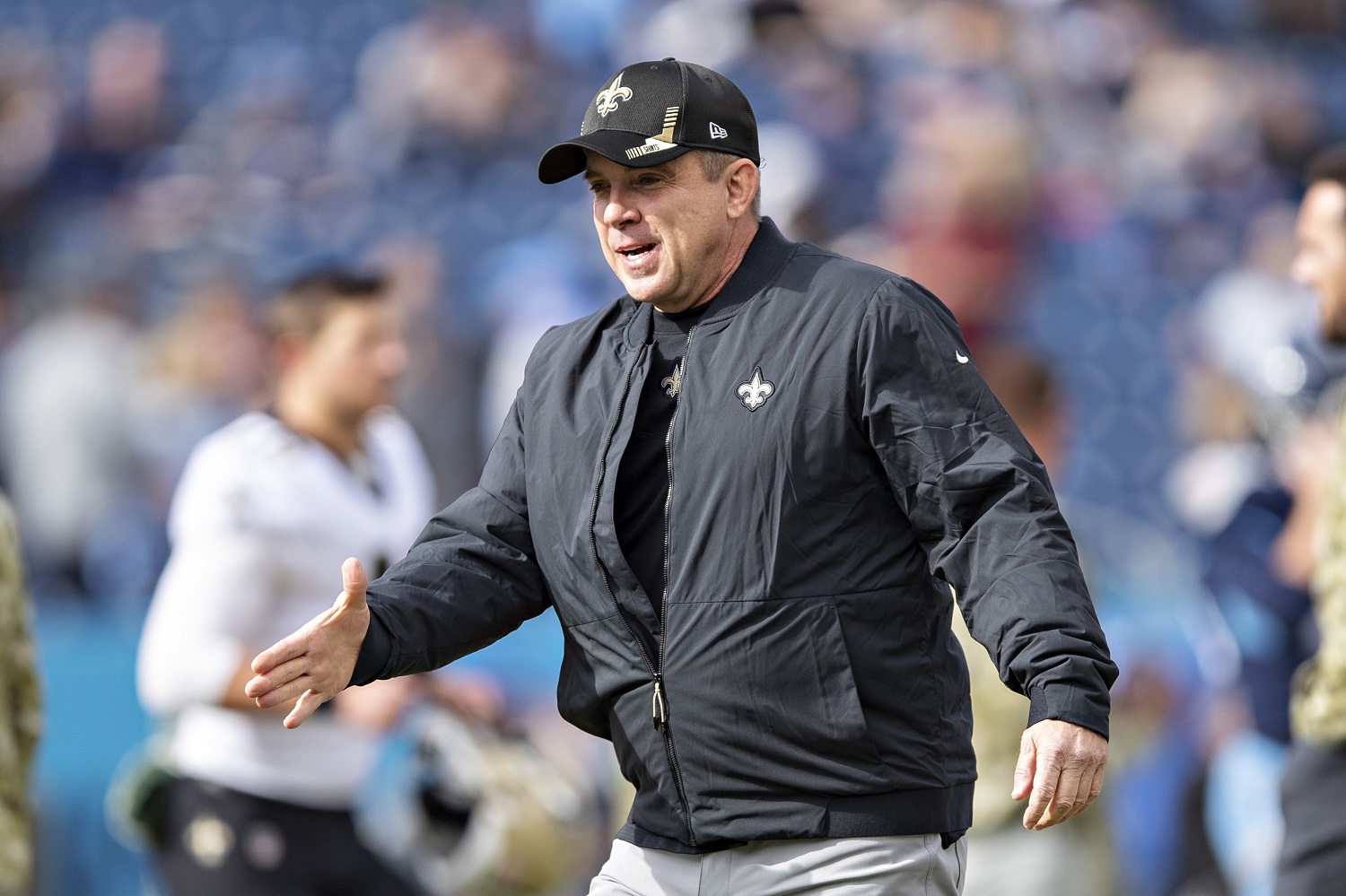 Coach Sean Payton of the New Orleans Saints shakes hands with players before a game against the Tennessee Titans on Nov. 14, 2021, in Nashville, Tennessee.