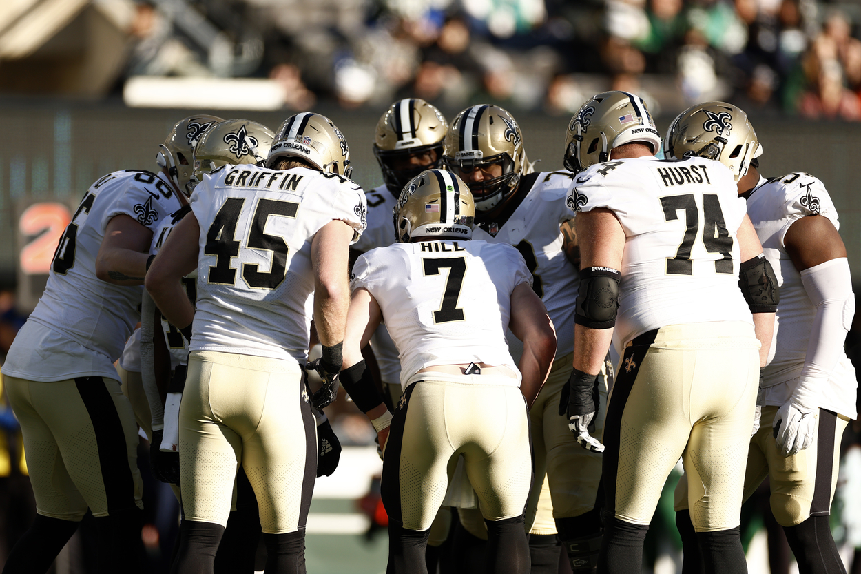 New Orleans Saints quarterback Taysom Hill and teammates in 2021.