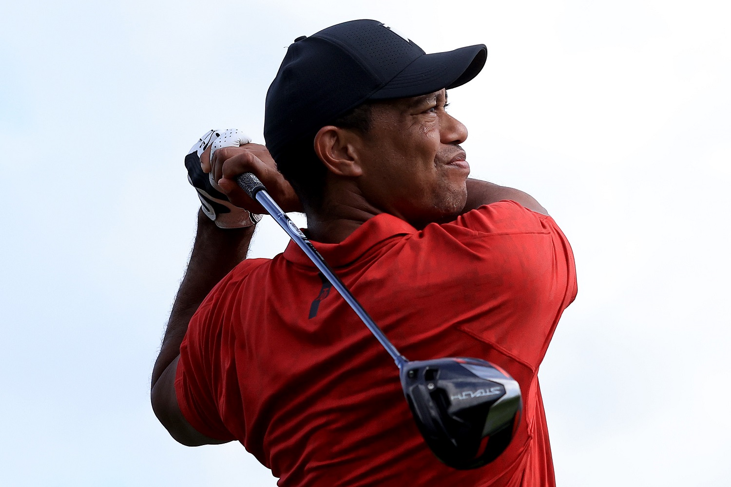 Tiger Woods plays a shot on the fifth hole during the final round of the PNC Championship on Dec. 19, 2021, in Orlando, Florida.